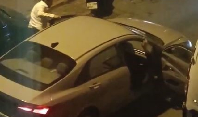 Esenyurt'ta kadını tekme ve yumruklarla aracına bindiren şahıs, etrafa küfürler savurdu