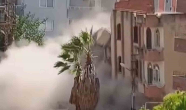 Meraklı vatandaşların bina çöktüğü esnada yaşadıkları panik kamerada