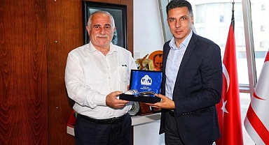 AMCAOĞLU’NU ZİYARET ETTİ