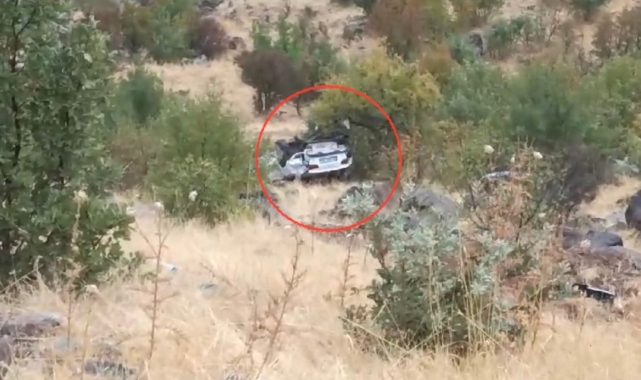 Metrelerce yüksekten uçuruma düşüp hurdaya dönen otomobilden sağ çıktı