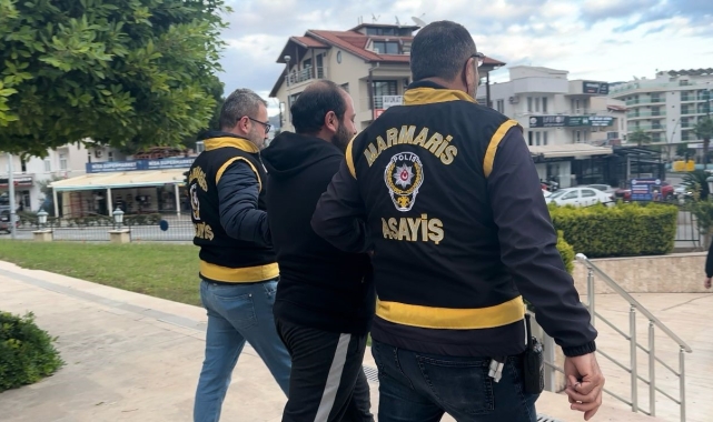Marmaris'te 9 ayrı dolandırıcılık suçundan aranan şahıs yakalandı