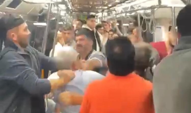 Metroda 'tükürük' kavgası kamerada: Metro boks ringini aratmadı