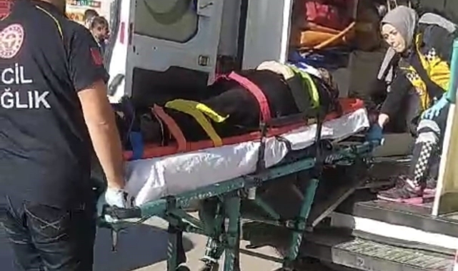 Yaralı eşinin elini hiç bırakmadı