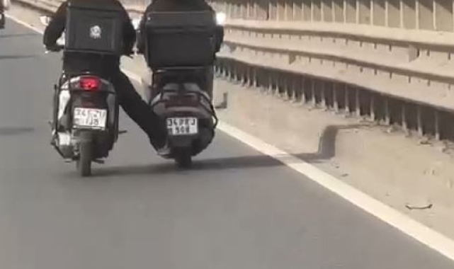 Bayrampaşa'da tehlikeli yolculuk kamerada, ayağıyla motosikleti itti