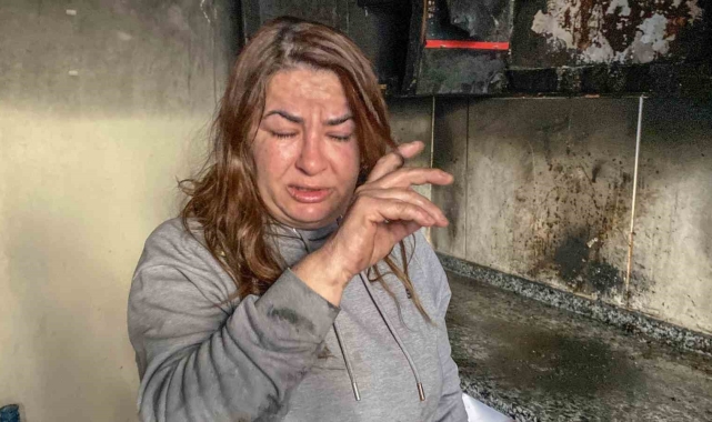 Evinin yandığını gören kadın kurye sinir krizi geçirdi