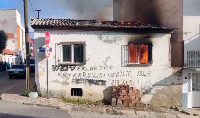 Metruk binada çıkan yangın mahalleyi sokağa döktü