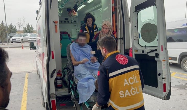 Yanan sürücü yarasını unutup sedye üzerinde yakınlarını teselli etti