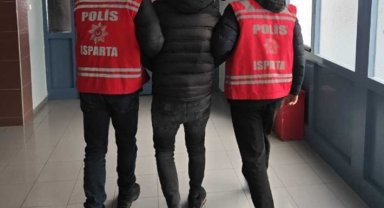 Isparta'da 12 yıl hapis cezasıyla aranan şahıs kaçarken yakalandı