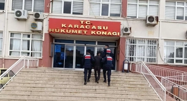 Silahlı yağma suçundan aranan şahıs Karacasu'da yakalandı