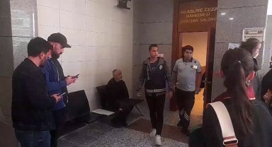 Kediyi camdan aşağı ittirerek yaralanmasına neden olduğu iddia edilen sınav gözetmeni hakim karşısında