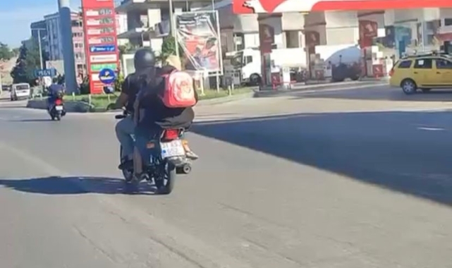 Bursa'da tehlikeli anlar: Bagajda 3 kişi, motosiklette 4 kişi