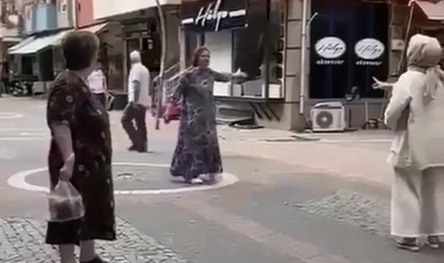 Eski eşinin kaçtığını düşündüğü kadının dükkanını taşladı