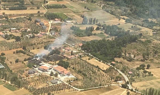 Menteşe'de arazi yangını ekiplerin zamanında müdahalesi ile söndürüldü