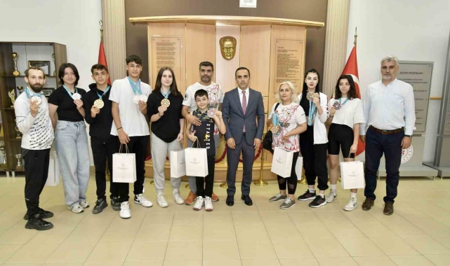 Şampiyon sporculardan Osman Ercan'a ziyaret