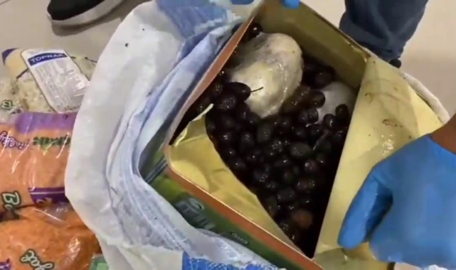 Kahramanmaraş'ta zeytin tenekesine gizlenmiş 4 kilo uyuşturucu ele geçirildi
