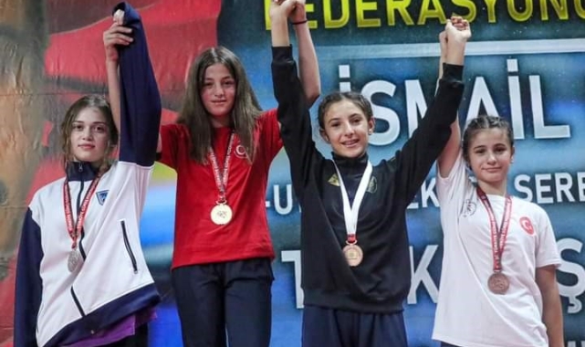 Taşoluk Belediye Spor Kulübü'nden bir şampiyon, bir üçüncülük