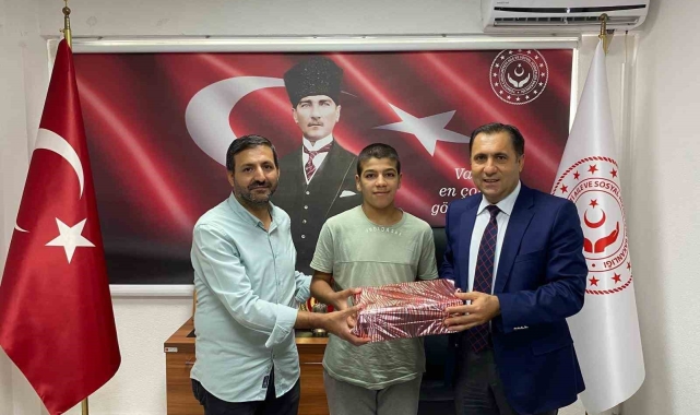 Başarılı güreşçiden anlamlı ziyaret