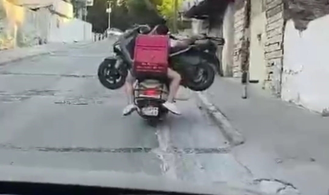 İzmir'de ilginç görüntü: Motosiklet üstünde motosiklet taşıdılar