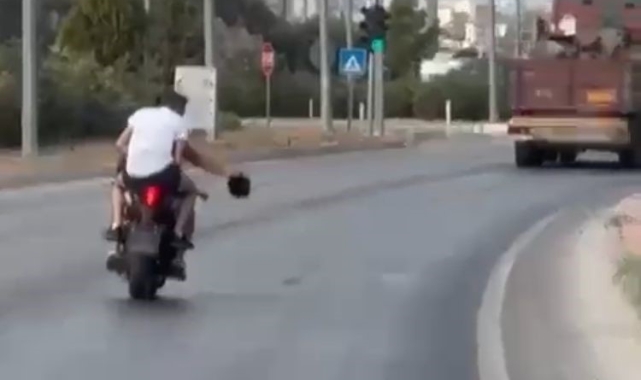 Kapkaç yapıp motosikletle kaçarken görüntülenen 2 şüpheli yakalandı