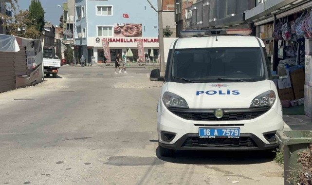Bursa'da silahlı kavga: Mermiler fotoğrafçı dükkanına isabet etti