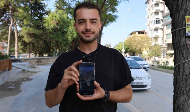 Cadde ortasında kucağında keçiyle yürüyen yaşlı kadın tebessüm ettirdi
