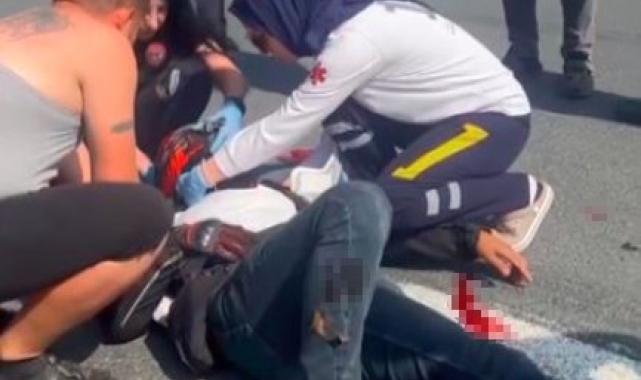 Motosikletten savrulan 2 kişi yaralandı