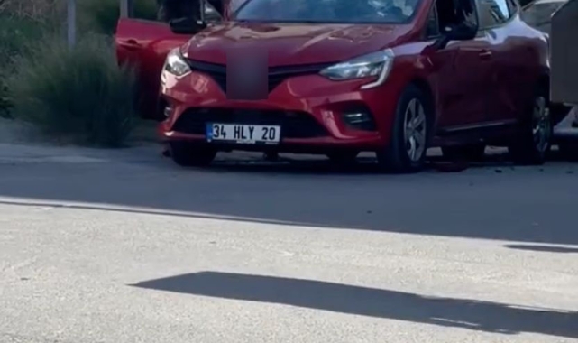 Arnavutköy'de bir kadın oğluna kızıp, aracına satırla saldırdı