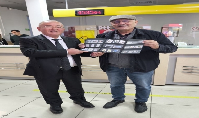 Giresun'da PTT 184. müşterisine pul kataloğu hediye etti