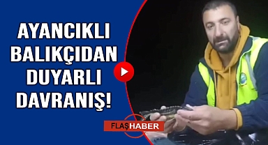 Nesli tükenmekte olan balığı tekrar denize bıraktı