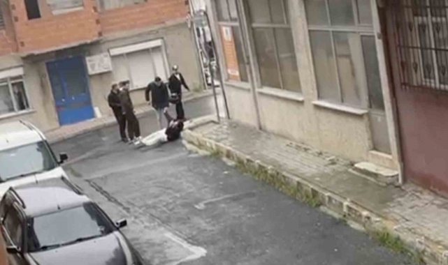 Tartıştıkları genci sokak ortasında acımasızca dövdüler