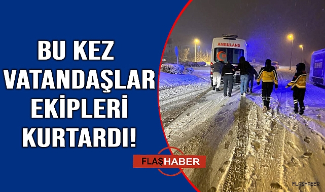 Yolda kalan ambulansı vatandaşlar itti