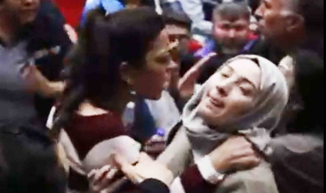 Sendika üyesi kadın, başörtülü basın mensubunun boğazını sıktı