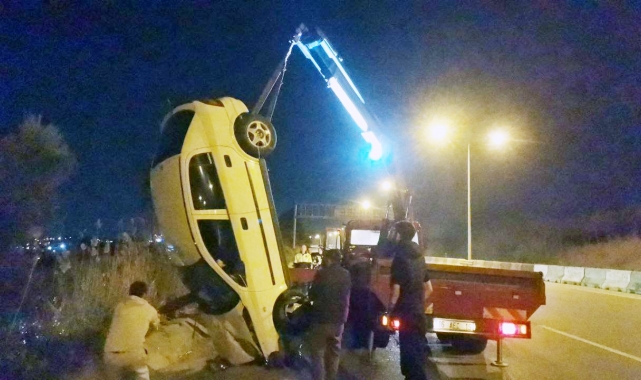 Takla atan otomobilden yaralı kurtuldu
