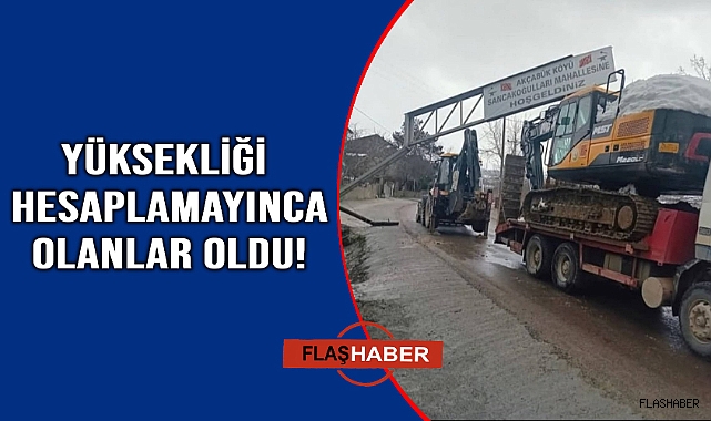 Sinop'ta yüksekliği hesaplayamayan iş makinesi yüklü kamyon tabelayı devirdi