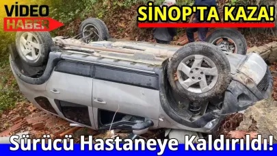 Sinop’ta istinat duvarından düşen araç takla attı