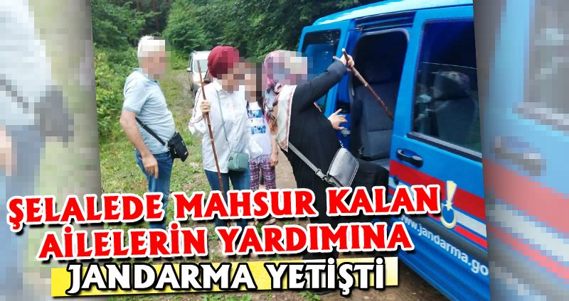 ŞELALEDE MAHSUR KALAN AİLELERİN YARDIMINA JANDARMA YETİŞTİ