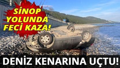 Sinop yolunda kontrolden çıkana otomobil deniz kenarına devrildi