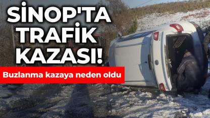 Buzlanma nedeniyle kayan otomobil yan yattı