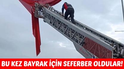 Boyabat'ta rüzgarda dolanan bayrağa itfaiye müdahelesi