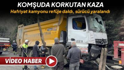 Hafriyat kamyonu refüje daldı, sürücü yaralandı