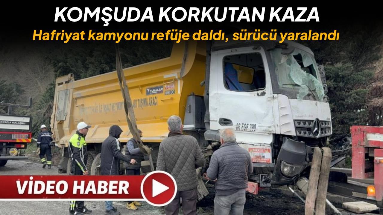 Hafriyat kamyonu refüje daldı, sürücü yaralandı