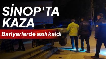 Kontrolden çıkan otomobil bariyerlerde asılı kaldı: 1 yaralı