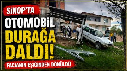 Sinop'ta kontrolden çıkan otomobil durağa çarptı